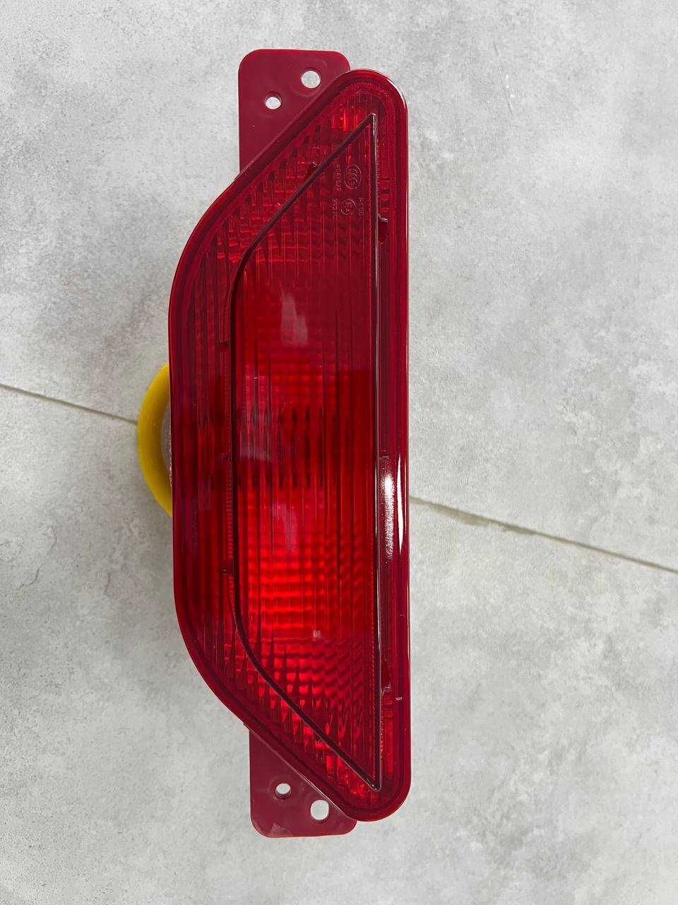 7054015600  后雾灯/ПТФ задняя центральная Geely Coolray SX